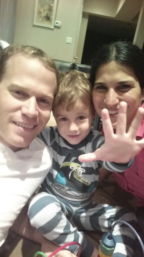 Using the hand gesture to take a group selfie