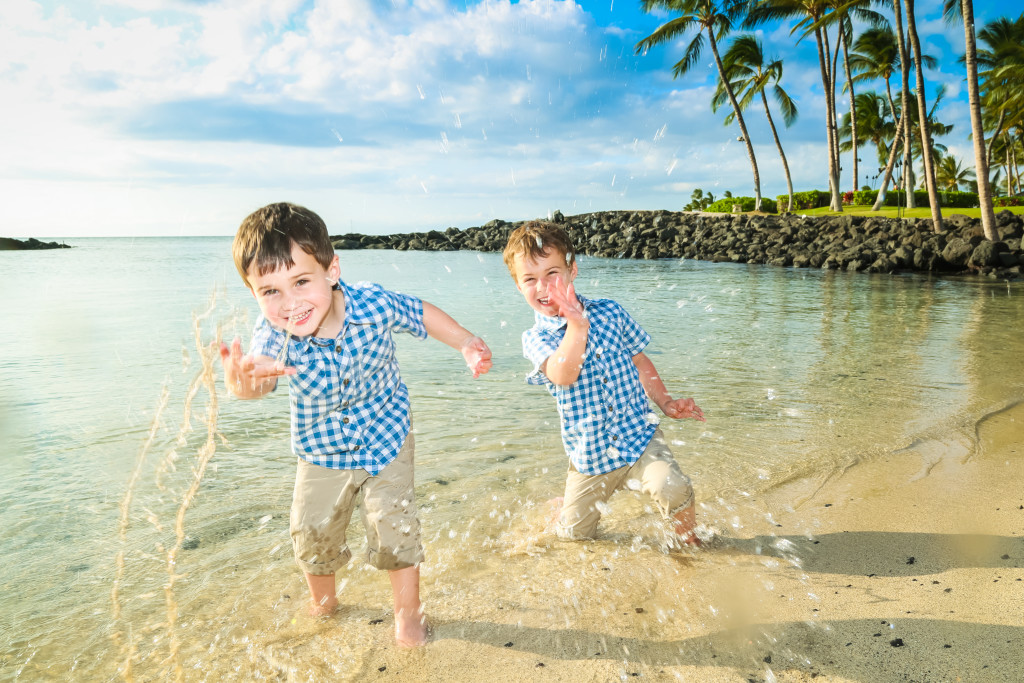 boys in ocean hawaii