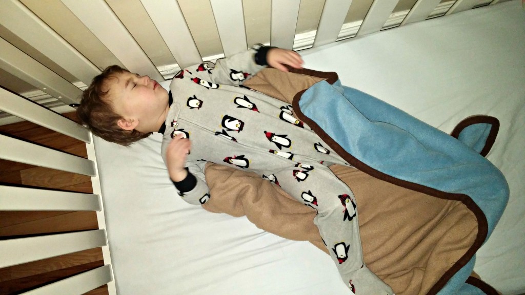Nate sleeping in crib
