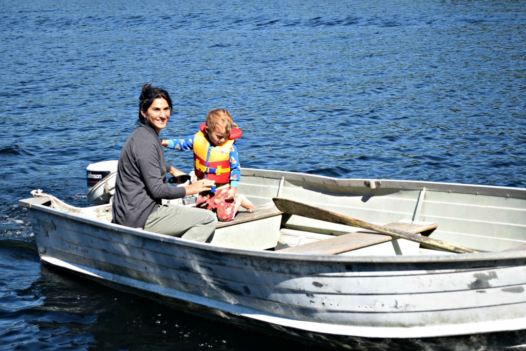 me driving the boat with Nate at cottage